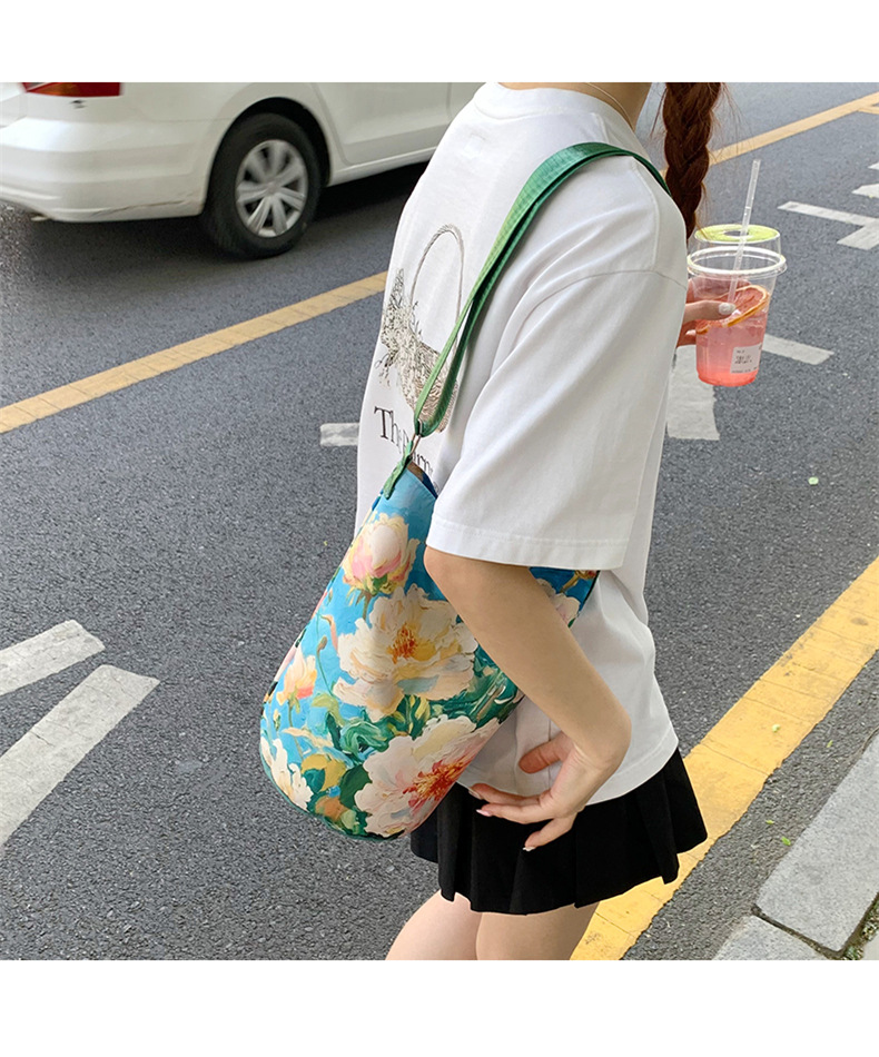 大容量国风印花水桶包女创意花卉个性手提单肩包设计感休闲斜挎包详情30