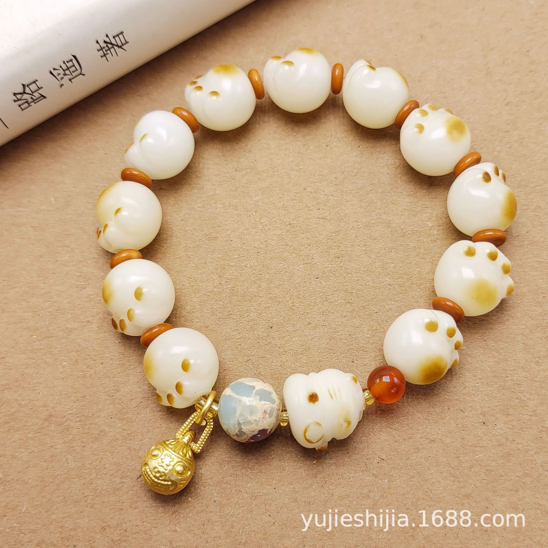 小红书炭烤猫爪菩提手串搭配风化菩提跑环手搓棉线流苏绕指柔手持详情5