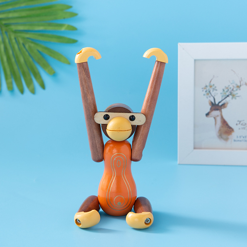 创意卡通木质摆件懒人桌面手机支架倒挂猴北欧风装饰品摆件批发详情9