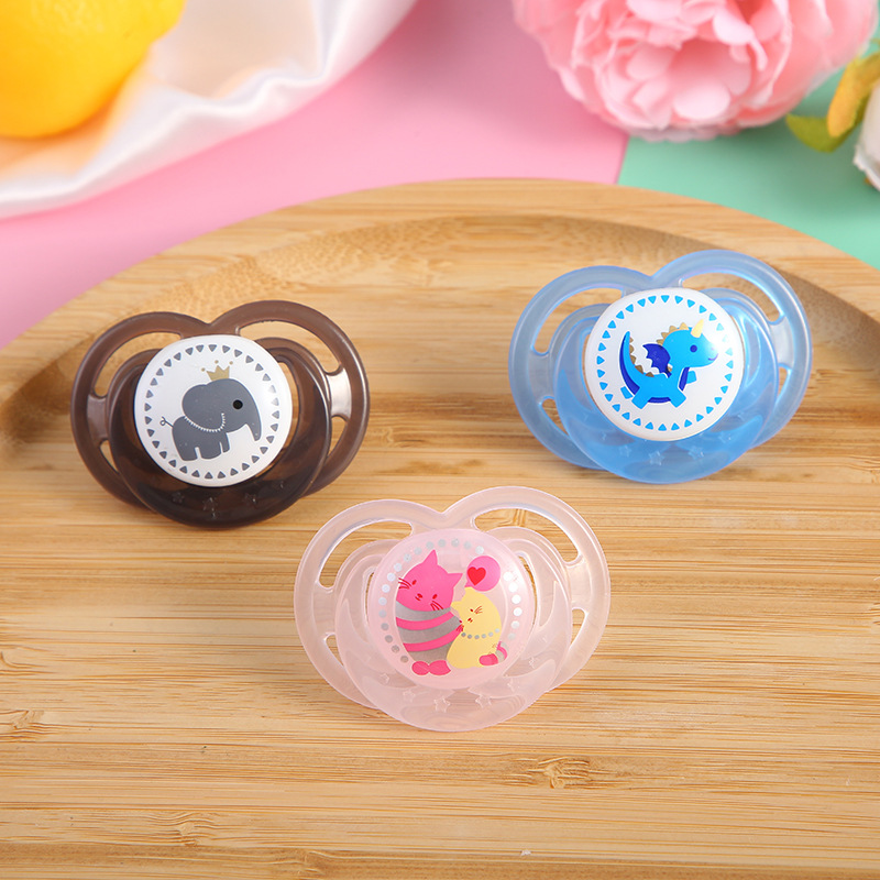 Wholesale of cartoon portable printed baby pacifiers with LIDS, silicone for babies to sleep soundly, durable and safe to play with pic 2