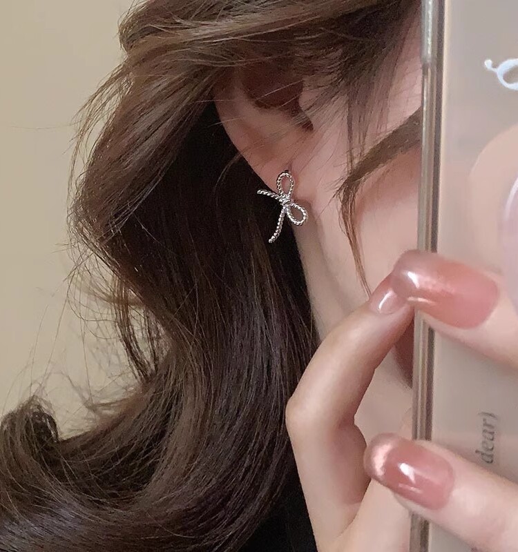 Niche and simple bow earrings for women, a Korean style with an Instagram vibe, a best-selling design, small and trendy ear studs, and exquisite ear buckles pic 6