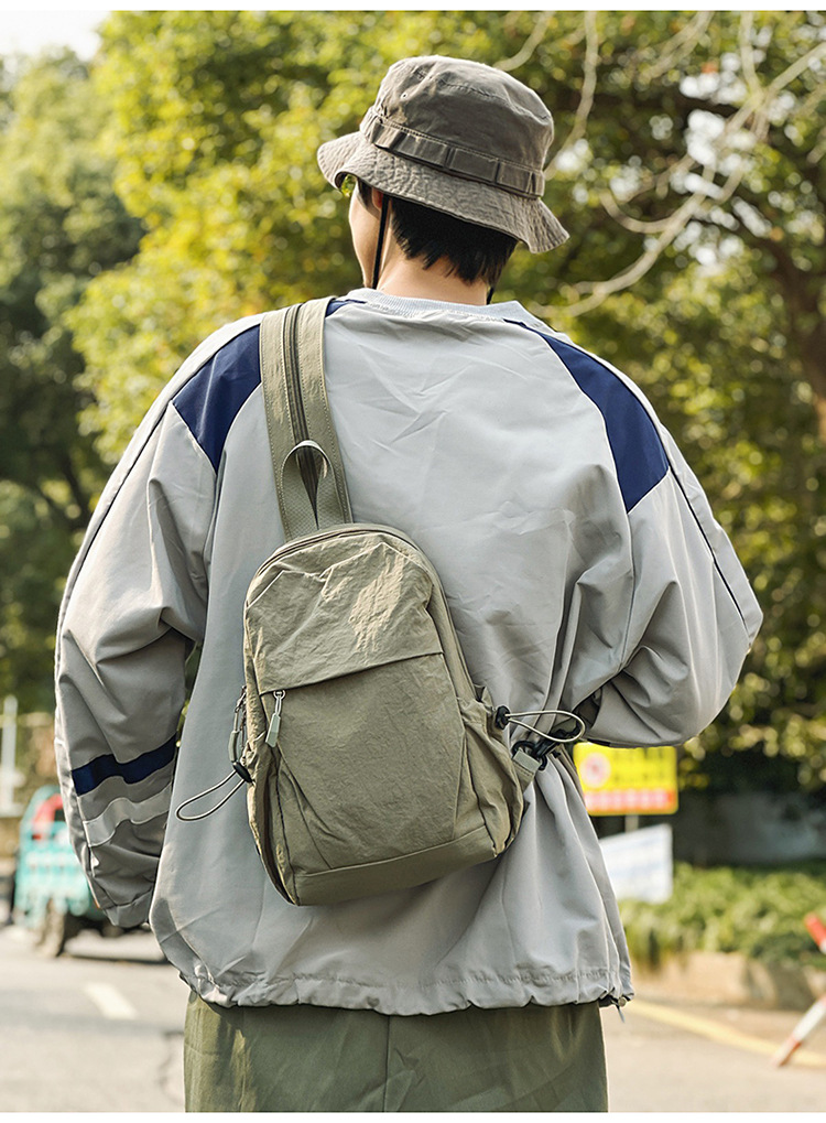 新款多功能防泼水双肩胸包男女轻便出游小背包男士户外登山斜挎包详情20