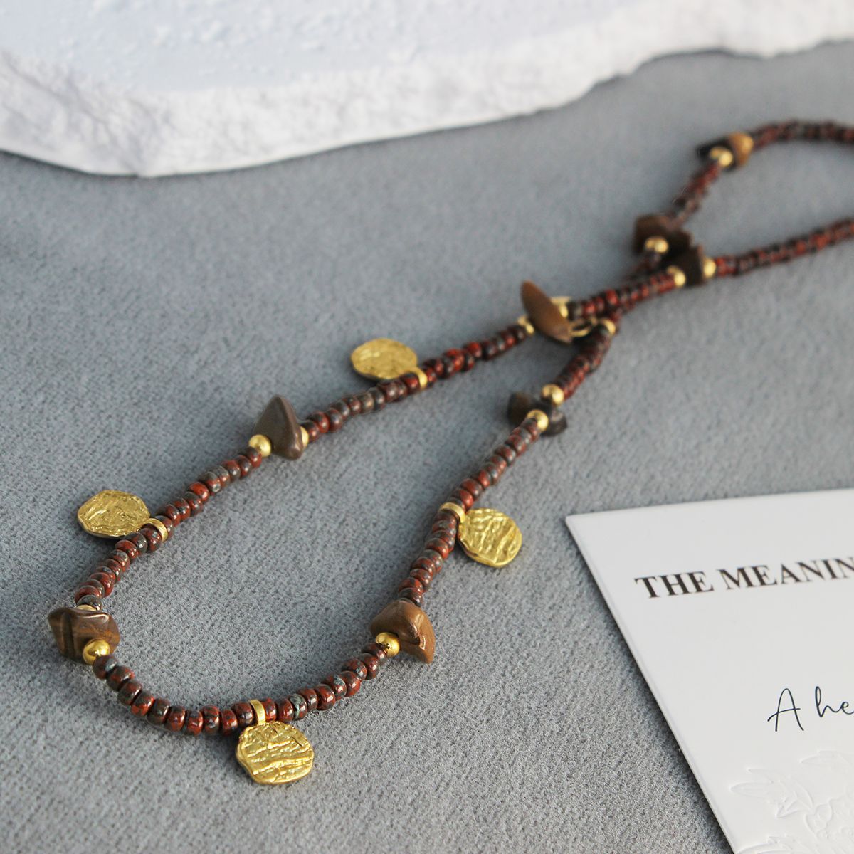 WENS雕刻纹理吊坠项链 跨年款法式复古小众设计高级感红珠毛衣链详情7