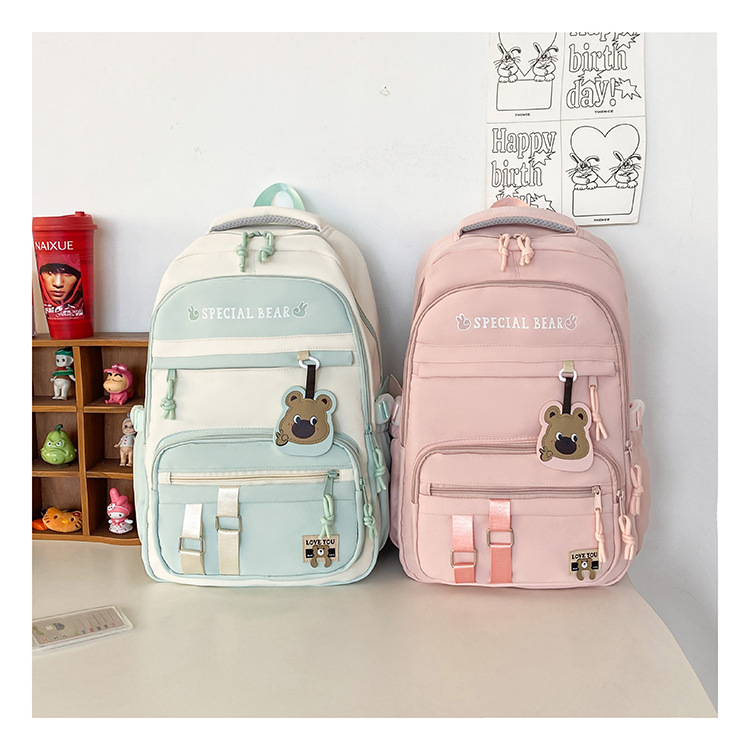 批发新款初高中学生大容量书包轻便减负背包小学生简约结实双肩包详情36