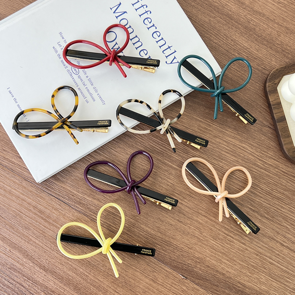 简约ins风交叉蝴蝶结夹子醋酸材质刘海夹高级感侧边碎发一字夹详情3