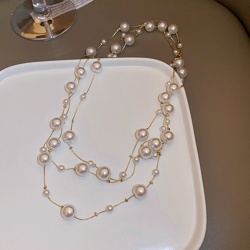 Irregular long pearl necklace, French light luxury style, sweater chain, niche simple and high-end necklace wholesale for women pic 8