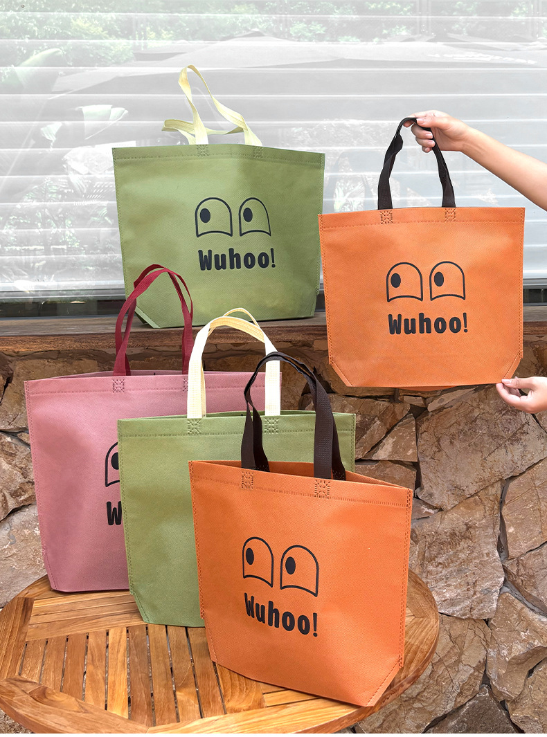 Creative Internet celebrity eye non-woven fabric bags, universal in-stock handbags, beveled gift bags, gift shop accessory packaging bags pic 1