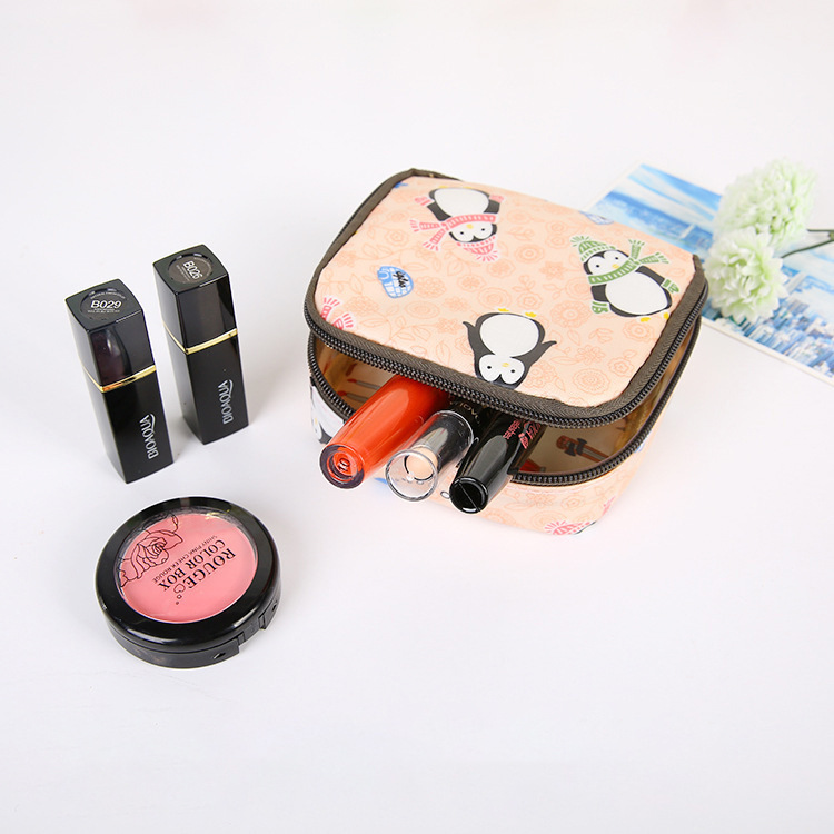 厂家直销韩国布艺防水大容量拉链卫生棉包姨妈巾化妆品收纳零钱包详情3