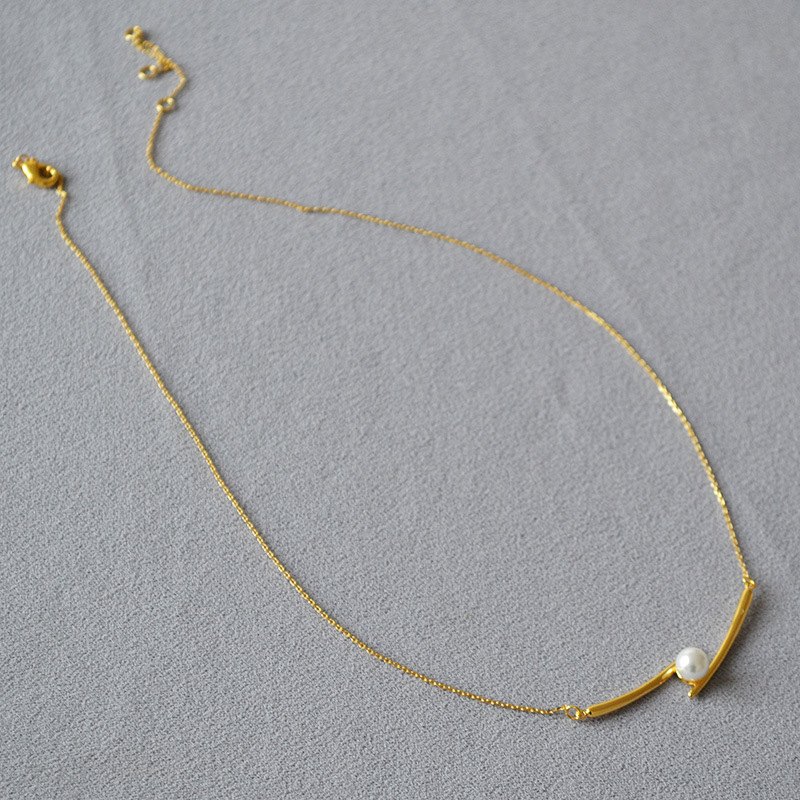 日韩小众设计黄铜镀金交叉微笑珍珠时尚简约轻奢高级感项链锁骨链详情5