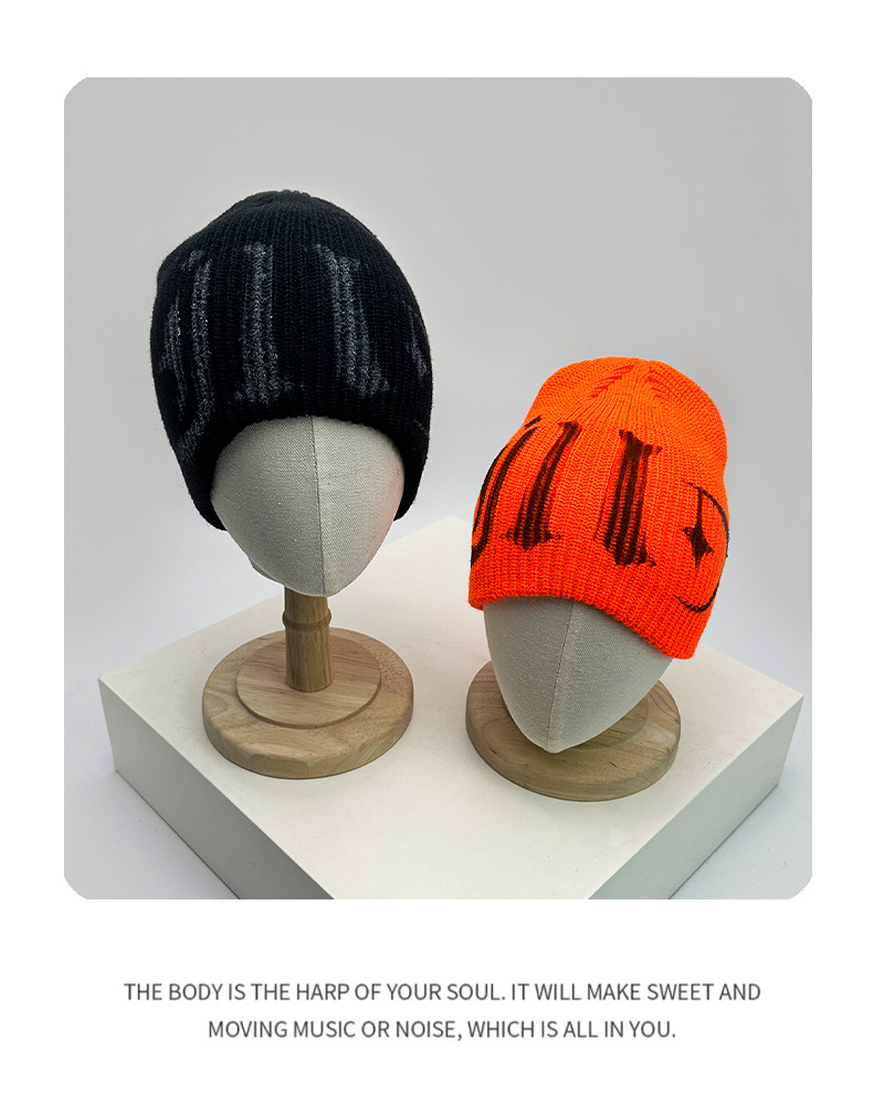 2025 New Korean-style sweet and cool Japanese-style letter cold cap, niche fashion, face-enhancing small ear-protecting knitted cap for winter pic 4