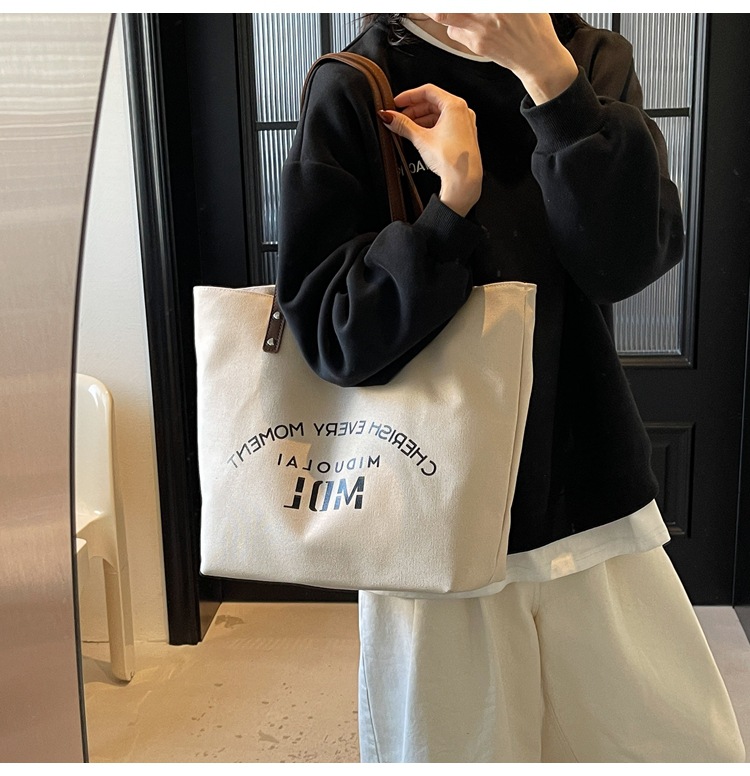 Large-capacity 2025 new style simple single-shoulder hand-carry cloth bag, college student class tote bag, versatile canvas bag for women pic 21