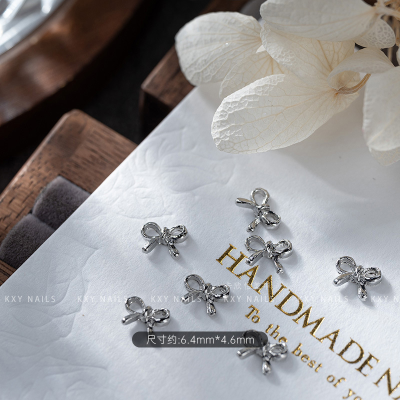 The alloy butterfly bow tie series of nail art accessories is a popular three-dimensional bestseller. It is a high-end and light luxury nail accessory with a butterfly diamond pattern pic 7