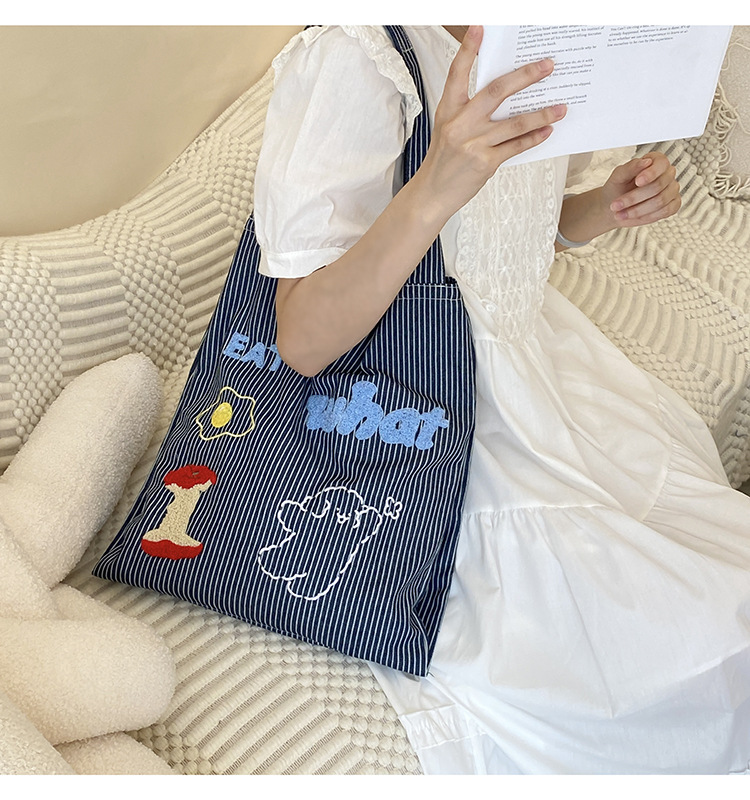 韩版时尚条纹帆布包包女2024新款大容量通勤托特包小众休闲布包详情10