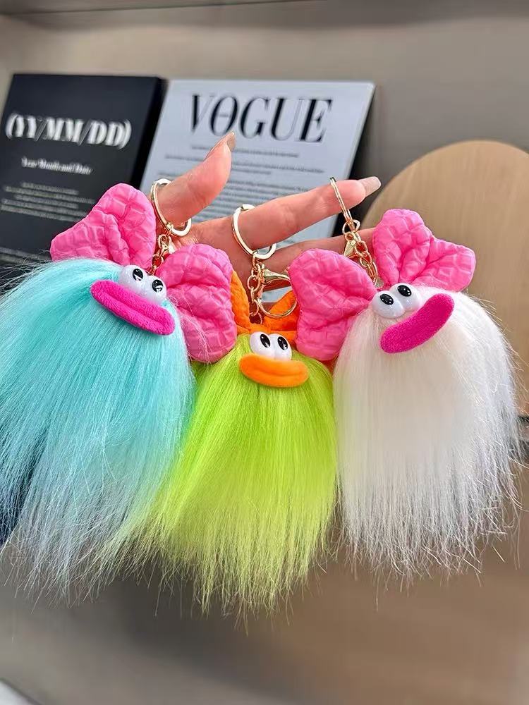 可爱蝴蝶结怪兽娃娃钥匙扣卡通搞怪毛绒书包挂件丑萌玩偶挂饰礼品详情6