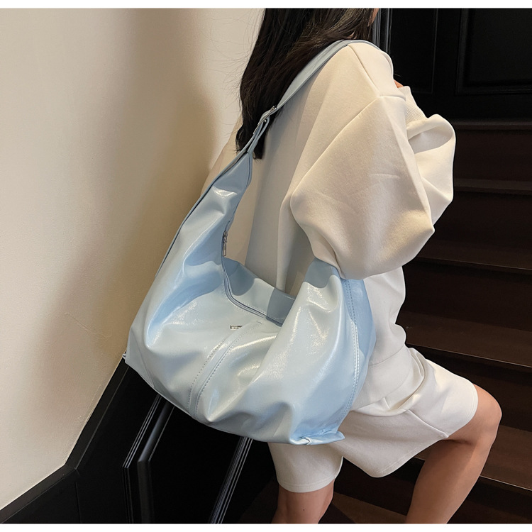 大容量腋下包女2025新款春夏季休闲百搭单肩斜挎包流行通勤饺子包详情9