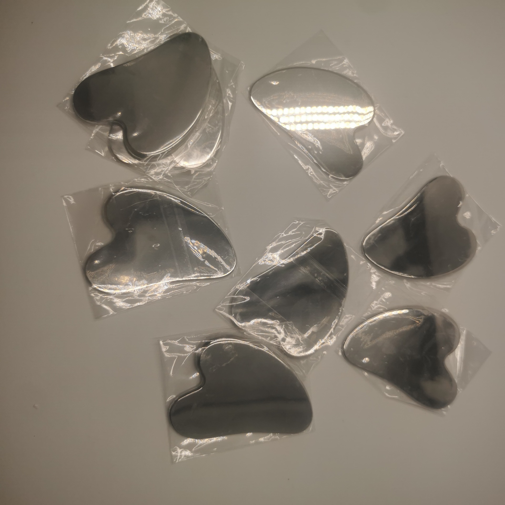 刮痧板不锈钢刮痧金属脸部心形提拉手指板大号紧致片按摩工具肩颈详情12