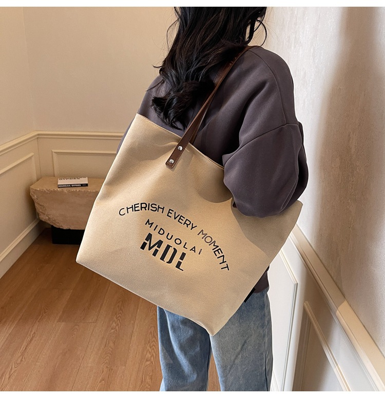 Large-capacity 2025 new style simple single-shoulder hand-carry cloth bag, college student class tote bag, versatile canvas bag for women pic 26