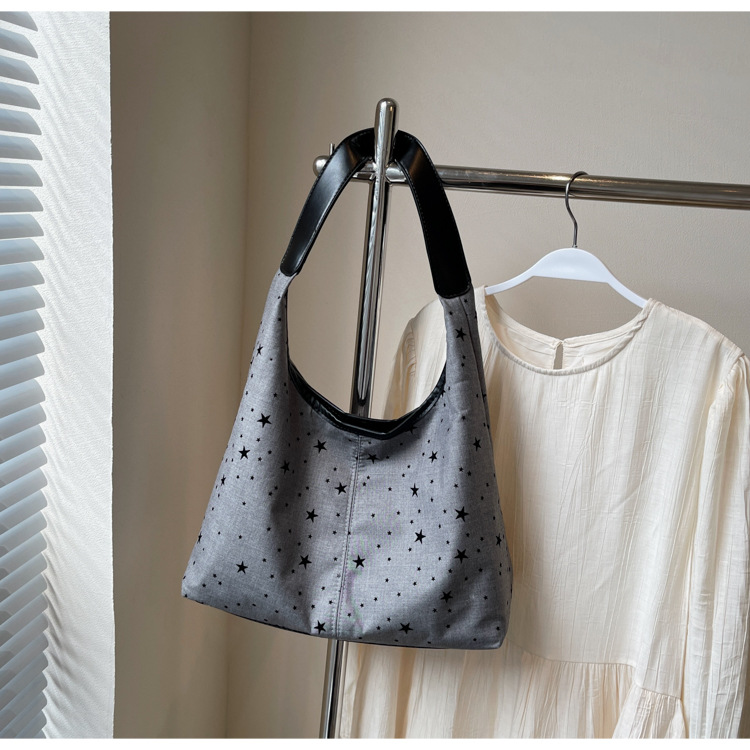 通勤大容量女包新款流行波点单肩包时尚百搭托特水桶包都市斜挎包详情1