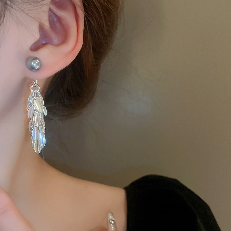 A pair of cold metallic leaf tassel imitation pearl silver needle earrings, a unique style, a high-end and elegant earpiece for women pic 5
