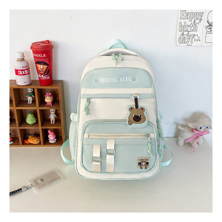 批发新款初高中学生大容量书包轻便减负背包小学生简约结实双肩包详情23