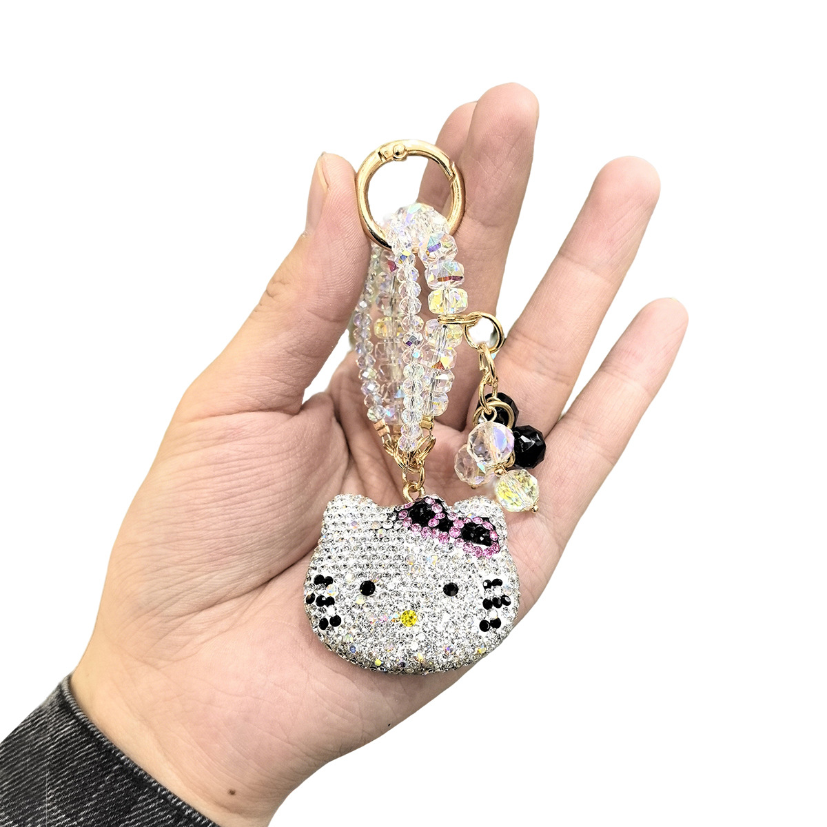 Cross-border light luxury full-diamond cartoon cat diamond rope pendant, creative car keychain, cute couple bow bag pendant pic 2