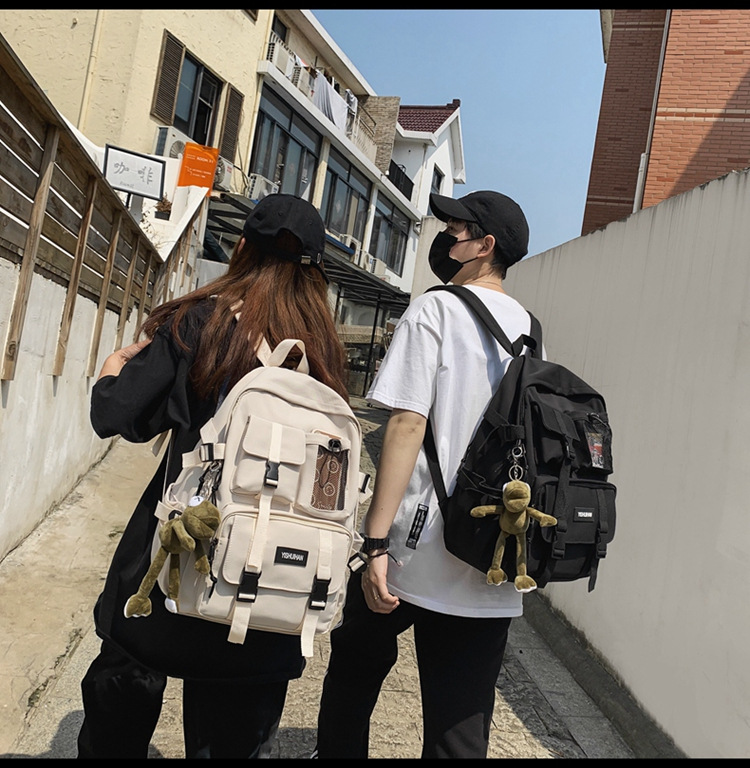 休闲百搭男女双肩包可爱挂件洋气潮流学生书包大容量工装风背包详情20