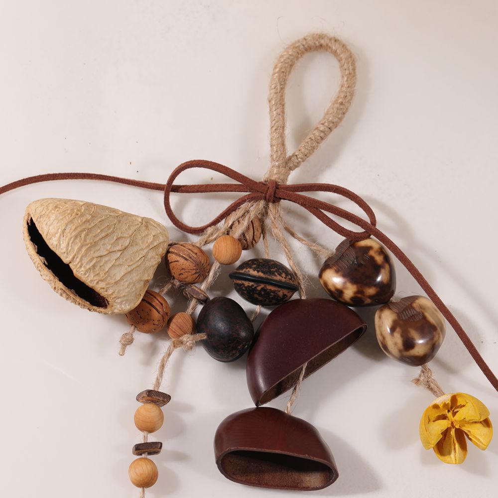 Indonesian handmade fruit shell wind chimes, natural Musical Instruments, sound therapy hand-cranked bells, fruit shell cranked bells, diy wind chime bags, hanging ornaments pic 2
