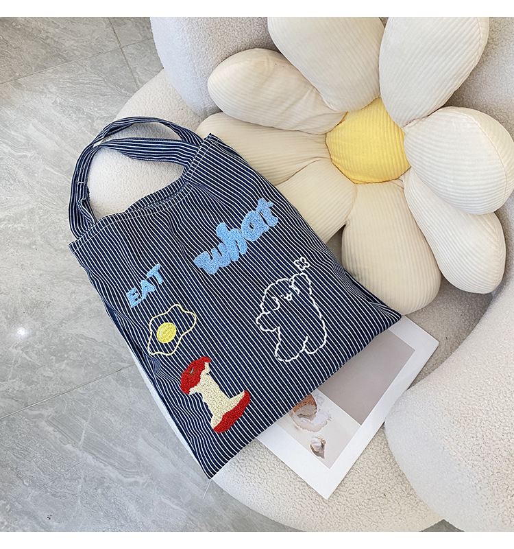 韩版时尚条纹帆布包包女2024新款大容量通勤托特包小众休闲布包详情6