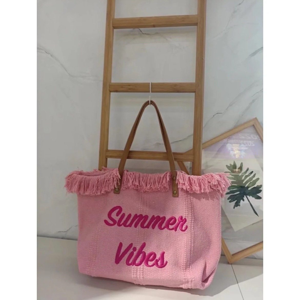 The 2023 new collection of handbags features simple and niche beach bags, travel bags, fringed tote bags, large-capacity single-shoulder bags, and is trendy pic 4