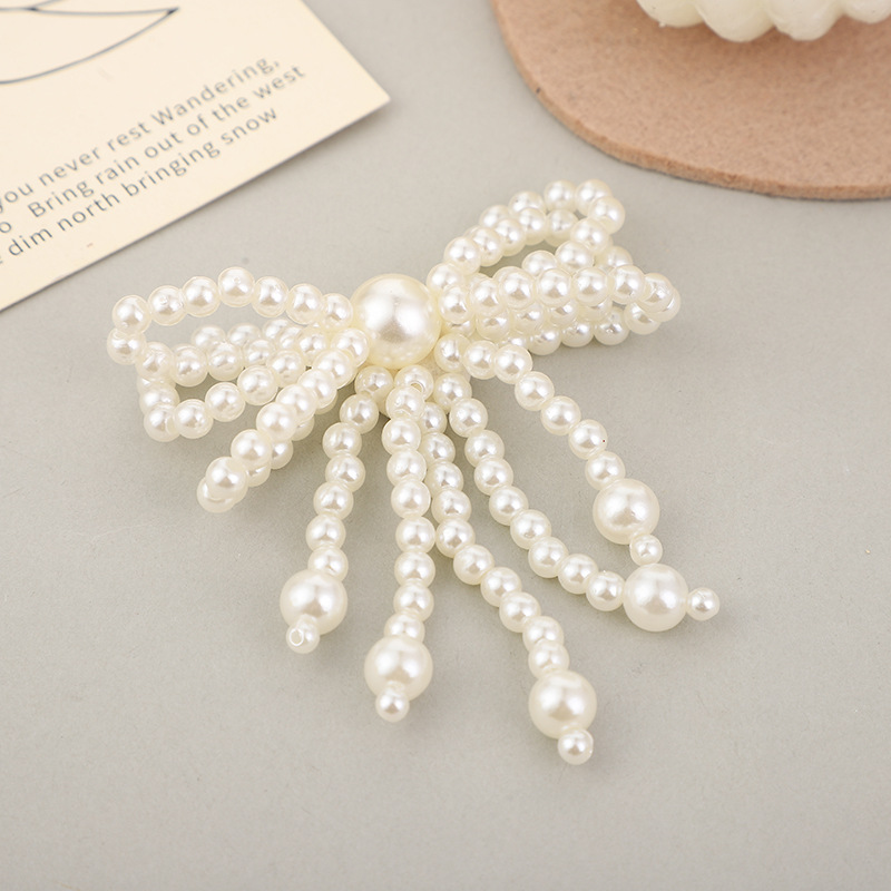 Factory wholesale of hand-woven pearl hair clips, material accessories, hand-sewn bow pendants, corsage accessories and accessories pic 4