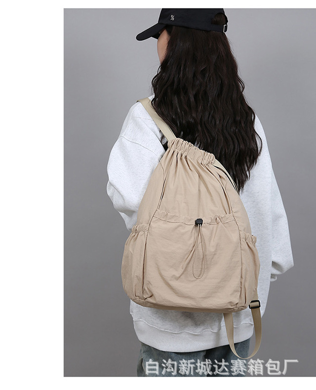 新款轻便束口抽绳双肩背包韩系大容量户外通勤休闲可折叠双肩包详情25