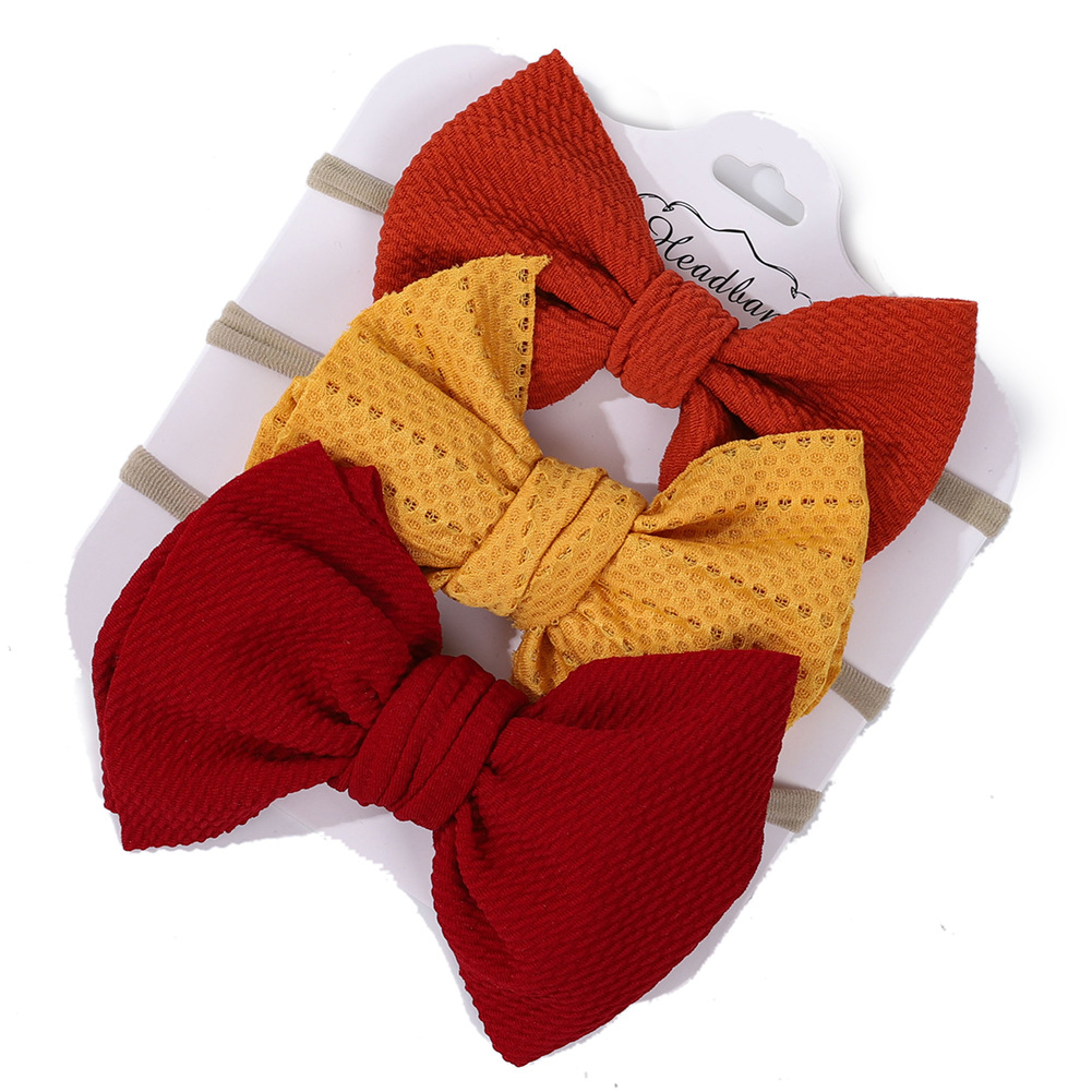 外贸新款蝴蝶结儿童发带婴儿纯色尼龙蝴蝶结发饰跨境手工打结头带详情6