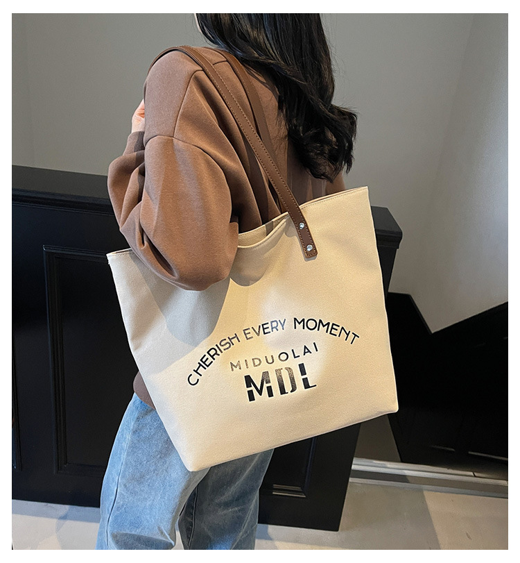 Large-capacity 2025 new style simple single-shoulder hand-carry cloth bag, college student class tote bag, versatile canvas bag for women pic 1
