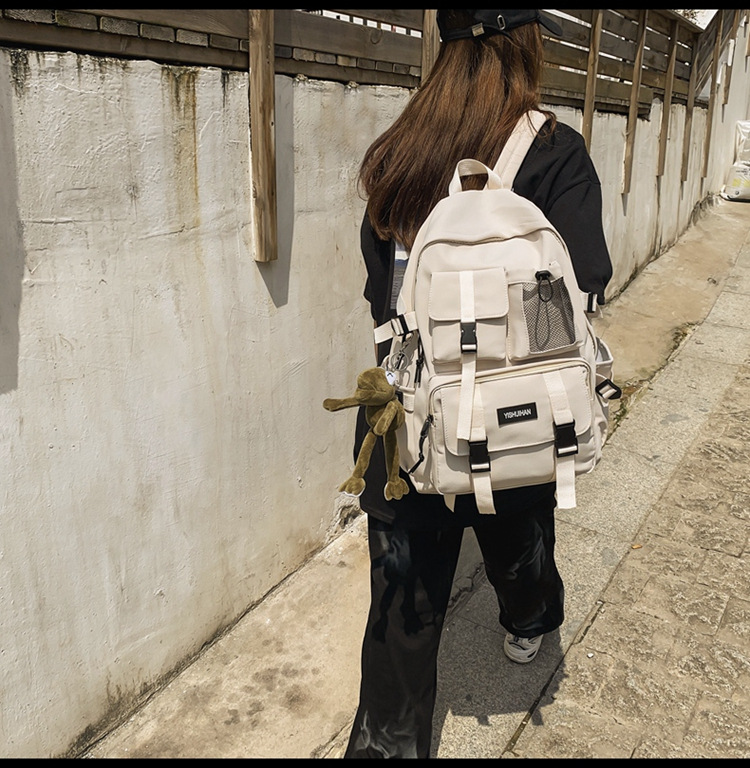 休闲百搭男女双肩包可爱挂件洋气潮流学生书包大容量工装风背包详情26
