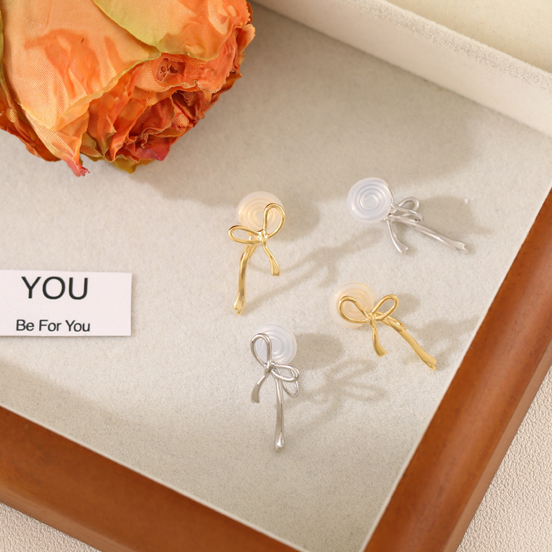 Chanel style simple bow hollowed-out stud earrings for girls, cute and versatile commuting earrings, personalized and trendy earrings wholesale pic 13