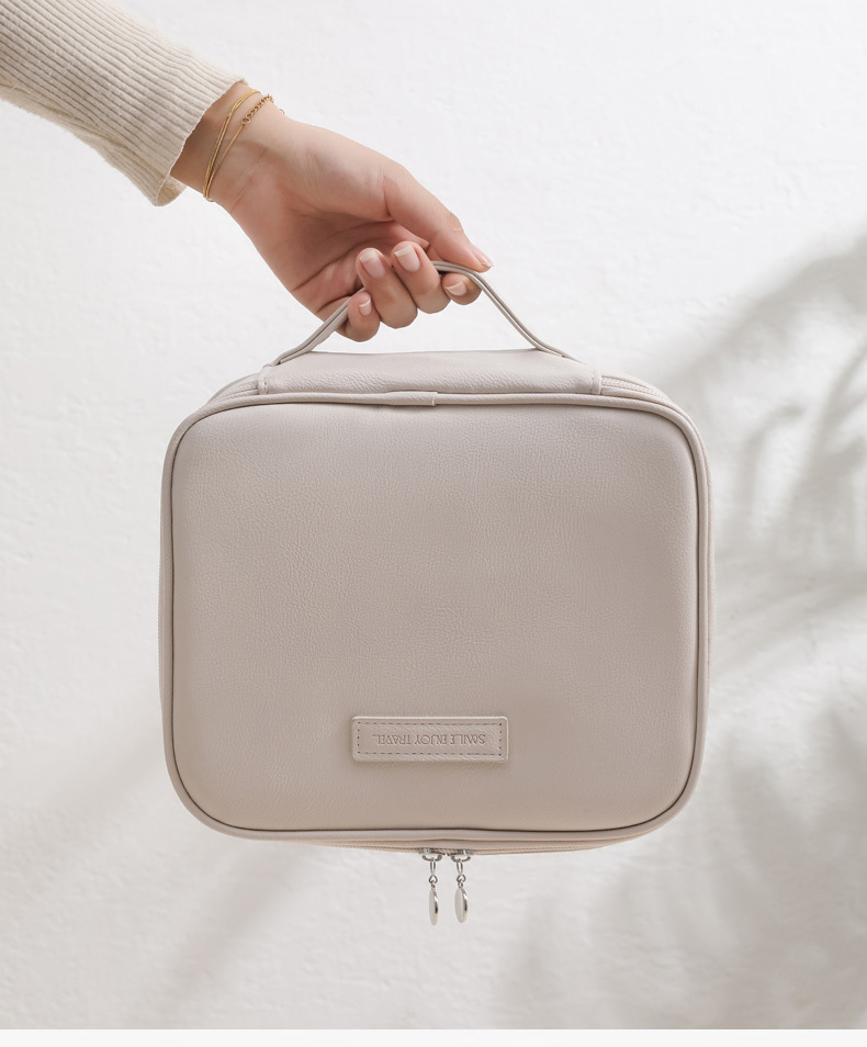 新款化妆包肤感PU皮便携旅行手提收纳洗漱包大容量厂家批发定LOGO详情4