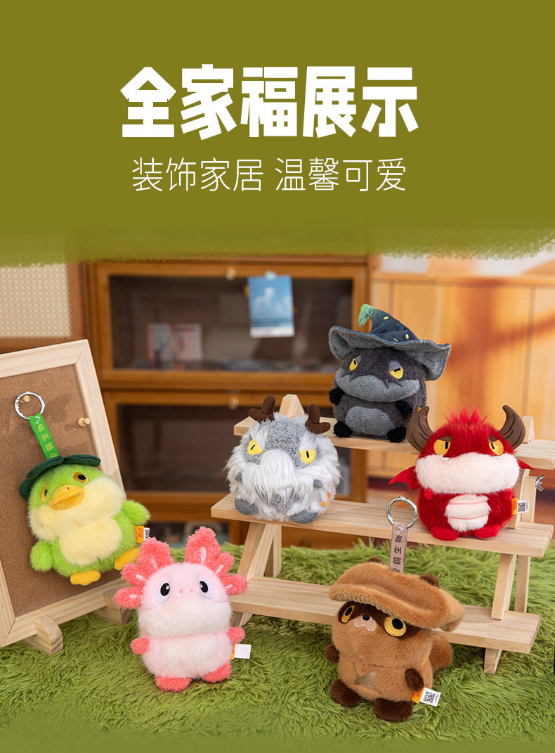 A grey totoro wearing a wizard hat and a red horned dragon plush toy AI star Man AI toy pic 19
