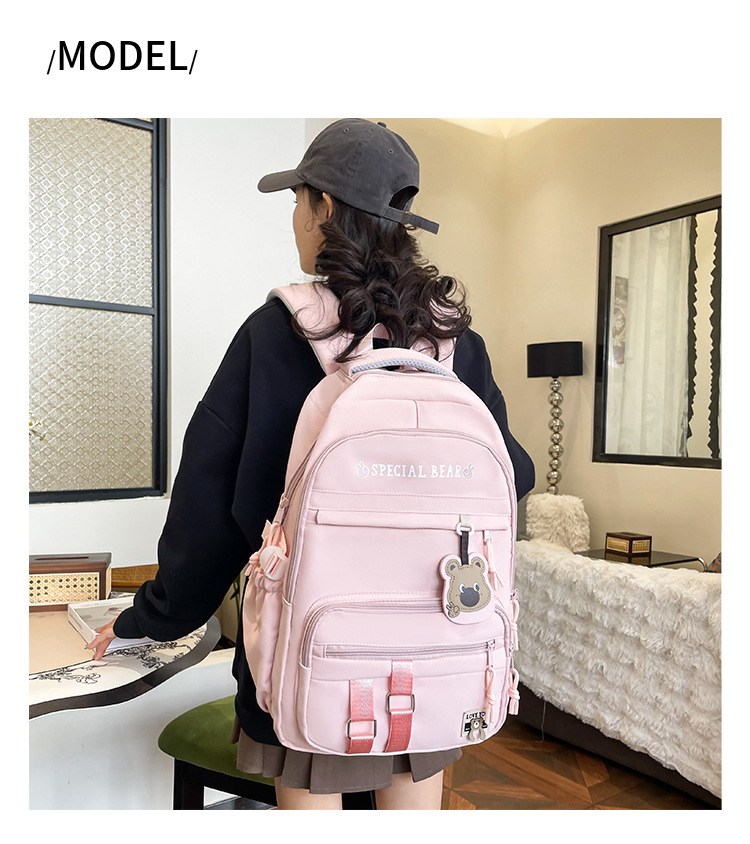 批发新款初高中学生大容量书包轻便减负背包小学生简约结实双肩包详情15