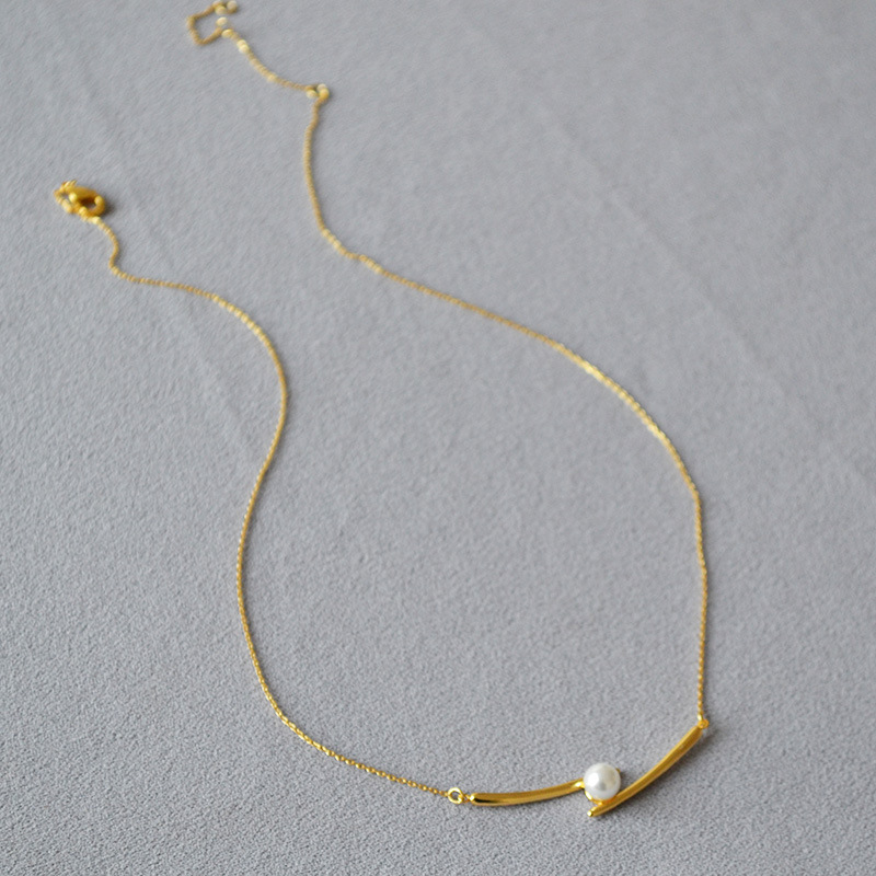 日韩小众设计黄铜镀金交叉微笑珍珠时尚简约轻奢高级感项链锁骨链详情8