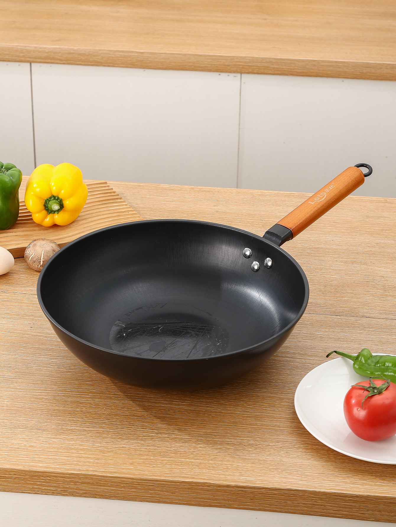 乐氏精制铸铁真不锈炒锅工厂批发不易粘锅不易生锈铁锅超市同款锅详情2