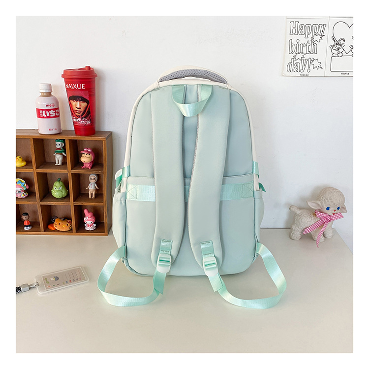 批发新款初高中学生大容量书包轻便减负背包小学生简约结实双肩包详情25