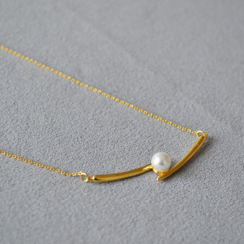 日韩小众设计黄铜镀金交叉微笑珍珠时尚简约轻奢高级感项链锁骨链详情3