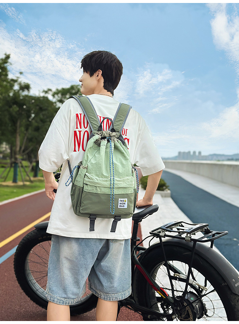 新款束口抽绳双肩包大容量休闲包户外运动登山包超轻量旅行背包详情30