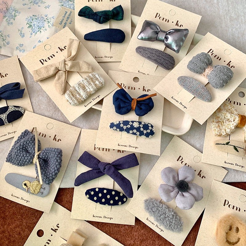 新款韩版布艺蝴蝶结发夹蓝色奶咖系格纹笑脸头饰边夹前额刘海夹详情2