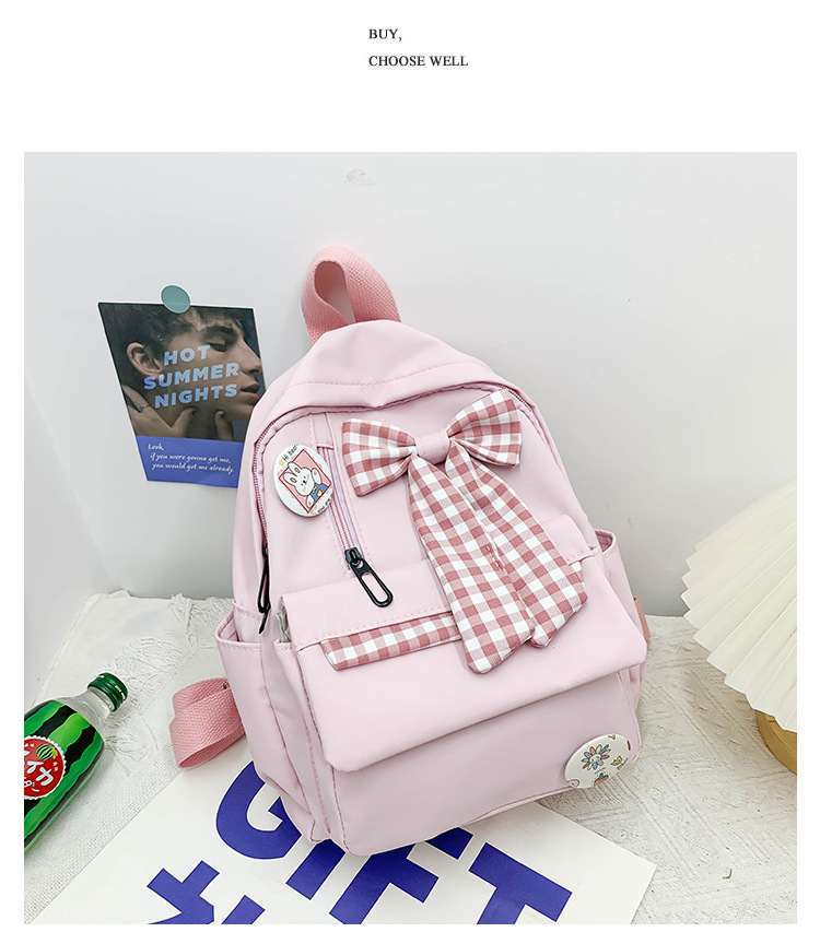 蝴蝶结书包女小学生大容量三到六年级初中轻便减负可爱简约双肩包详情17