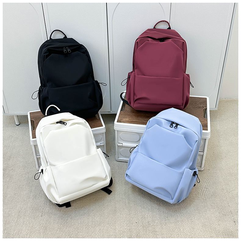 New large-capacity solid color backpacks for girls in foreign trade, simple and elegant school bags for junior and senior high school students pic 12