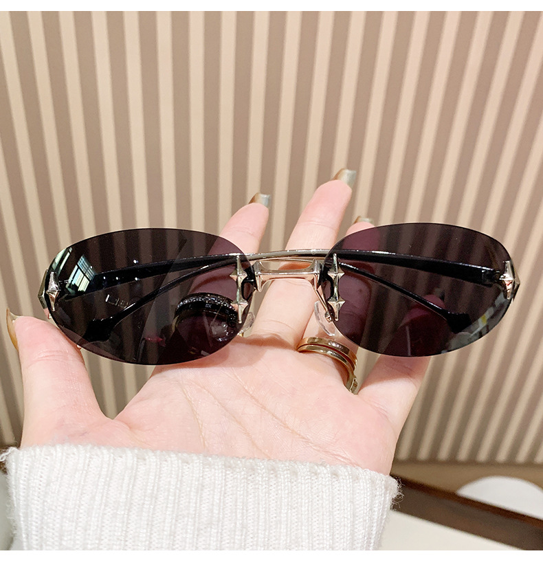 欧美无框椭圆复古高级感墨镜Y2K辣妹个性户外防晒星星跨境墨镜女详情3