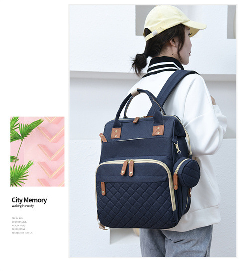 跨境专供高级感妈咪包大容量轻便母婴床包挂童车多功能手提双肩包详情28