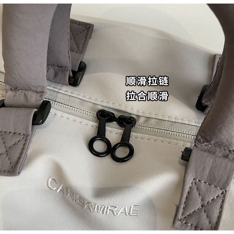 短途旅行包女轻便多功能斜挎运动健身包手提出差大容量收纳行李袋详情7