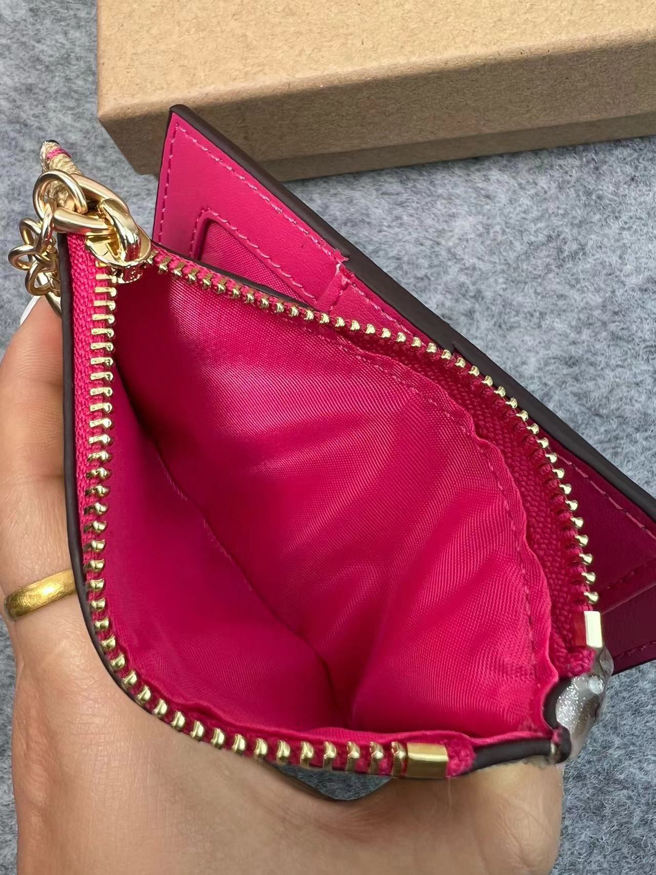 C家两折钱包多卡位PVC印花拉链钱包真皮手拿证件包多款可选详情11